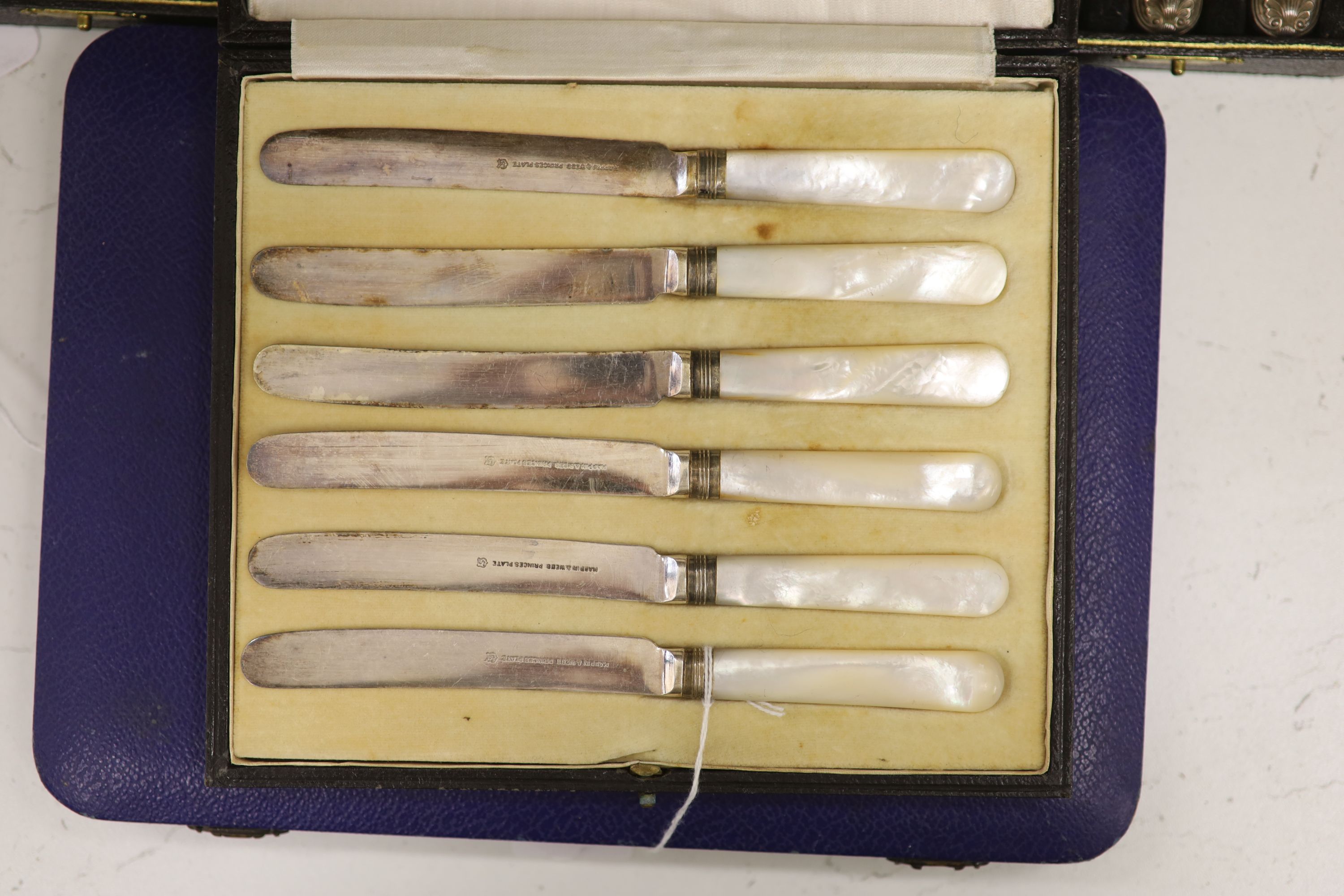 Six pairs of silver-handled fish eaters, six pairs of bone-handled fruit eaters and two other cased sets,